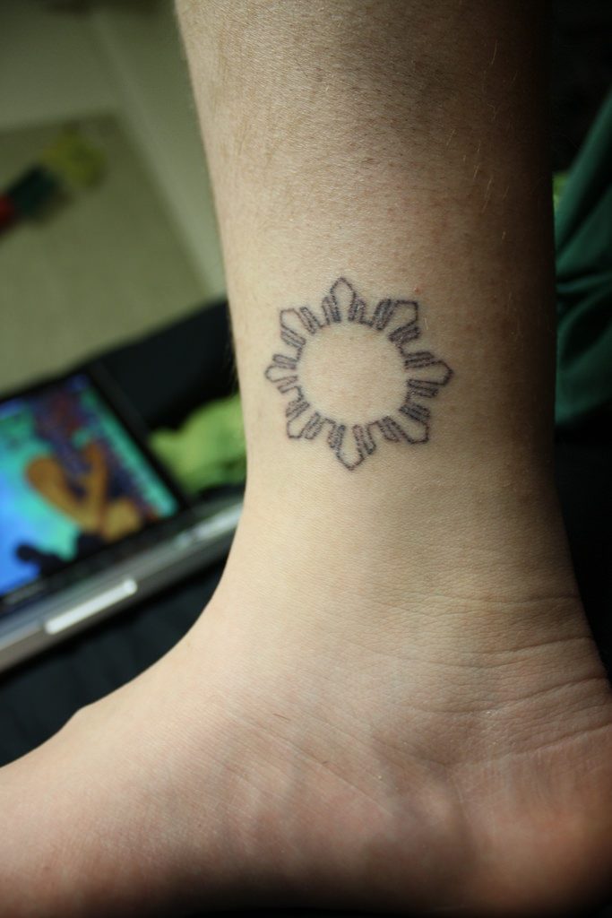 Stick and poke tattoo